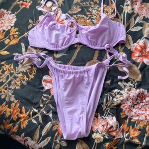 Lilac color two piece bikini The bottom is a medium and the top is a large